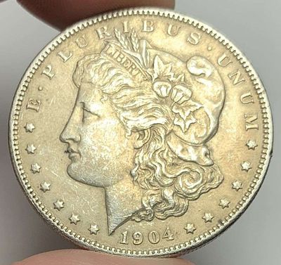 Rare 1904 Morgan Silver Dollar AU58. Winner shall recieve the exact coin shown here. (MR/B)