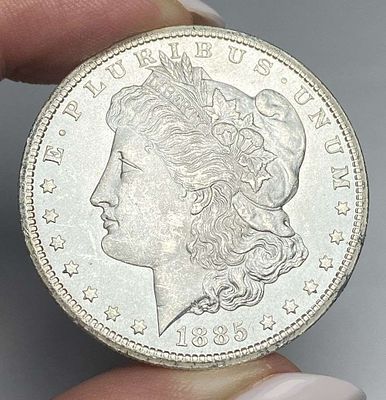 1885-CC Morgan Silver Dollar MS63. Winner shall receive the exact item shown here. (MR/RFR)