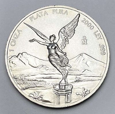 Rare 2000 Mexican Libertad 1 ozt .999 Silver. Winner shall receive the exact coin shown here. (RR/RB)