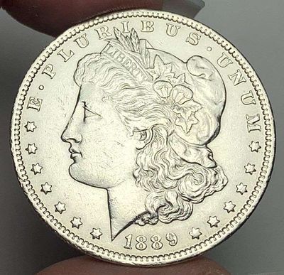 1889-O Morgan Silver Dollar AU58. A very special consignment. Once in a great while, some really 