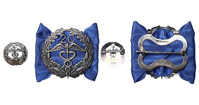 Finland, 2x Silver badges, "For qualifying 20 years". Description : Finland, 2x Silver badges 