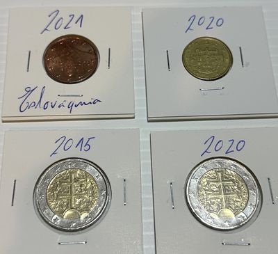 Lote C/ 4 Moedas da Eslov&aacute;quia. Moedas Circuladas. 
Cabe ao licitante verificar cuidadosamente 