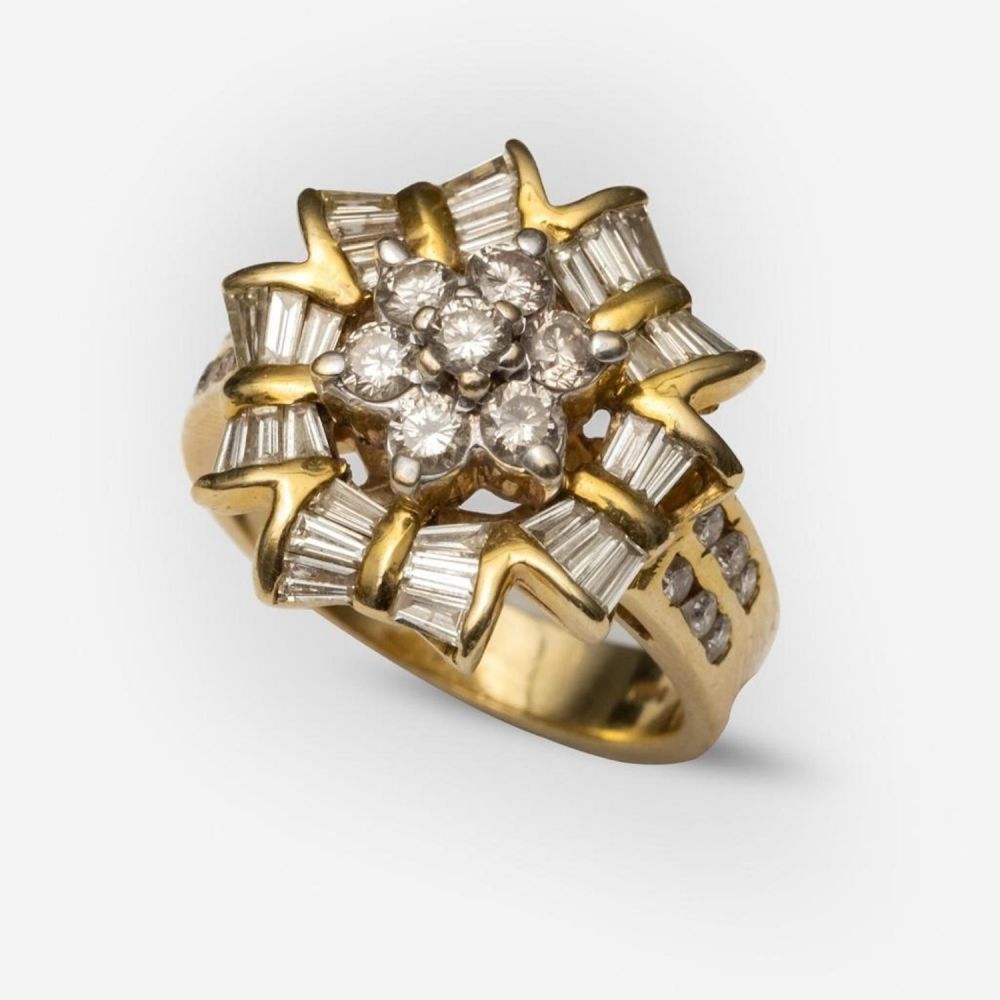 Lot 203: GIA Vintage 1950's gold and diamond cluster ring