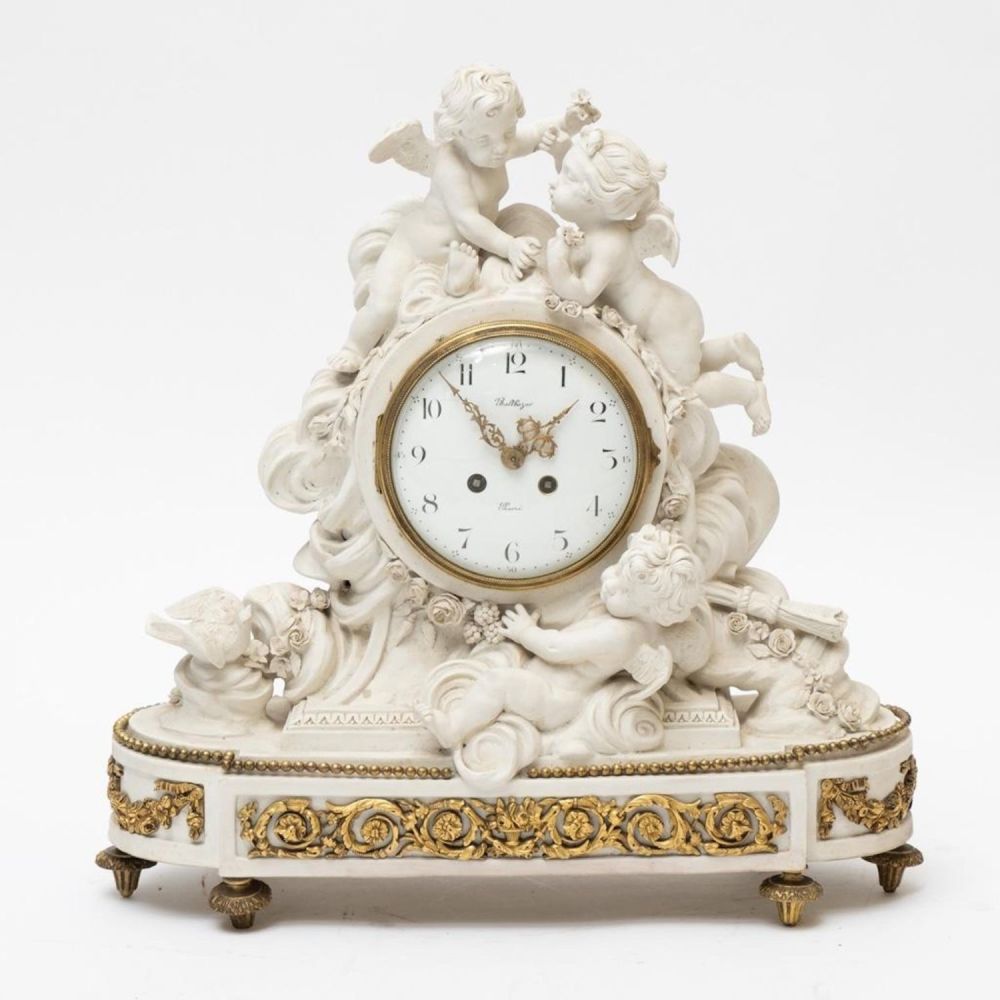 Lot 296: Balthazar Paris Bisque Cupid Mantel Clock