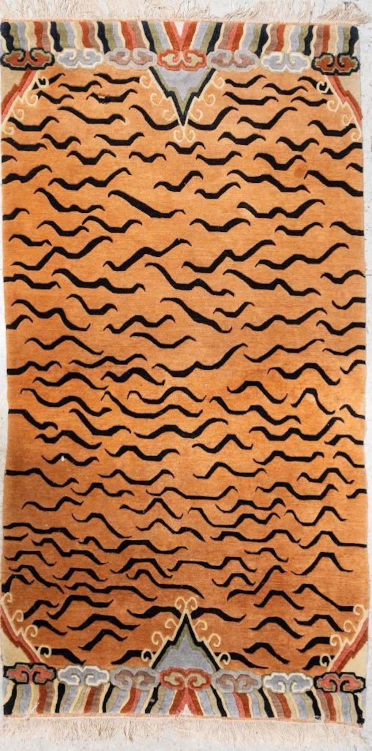 Lot 547: Antique Tibetan Tiger Rug