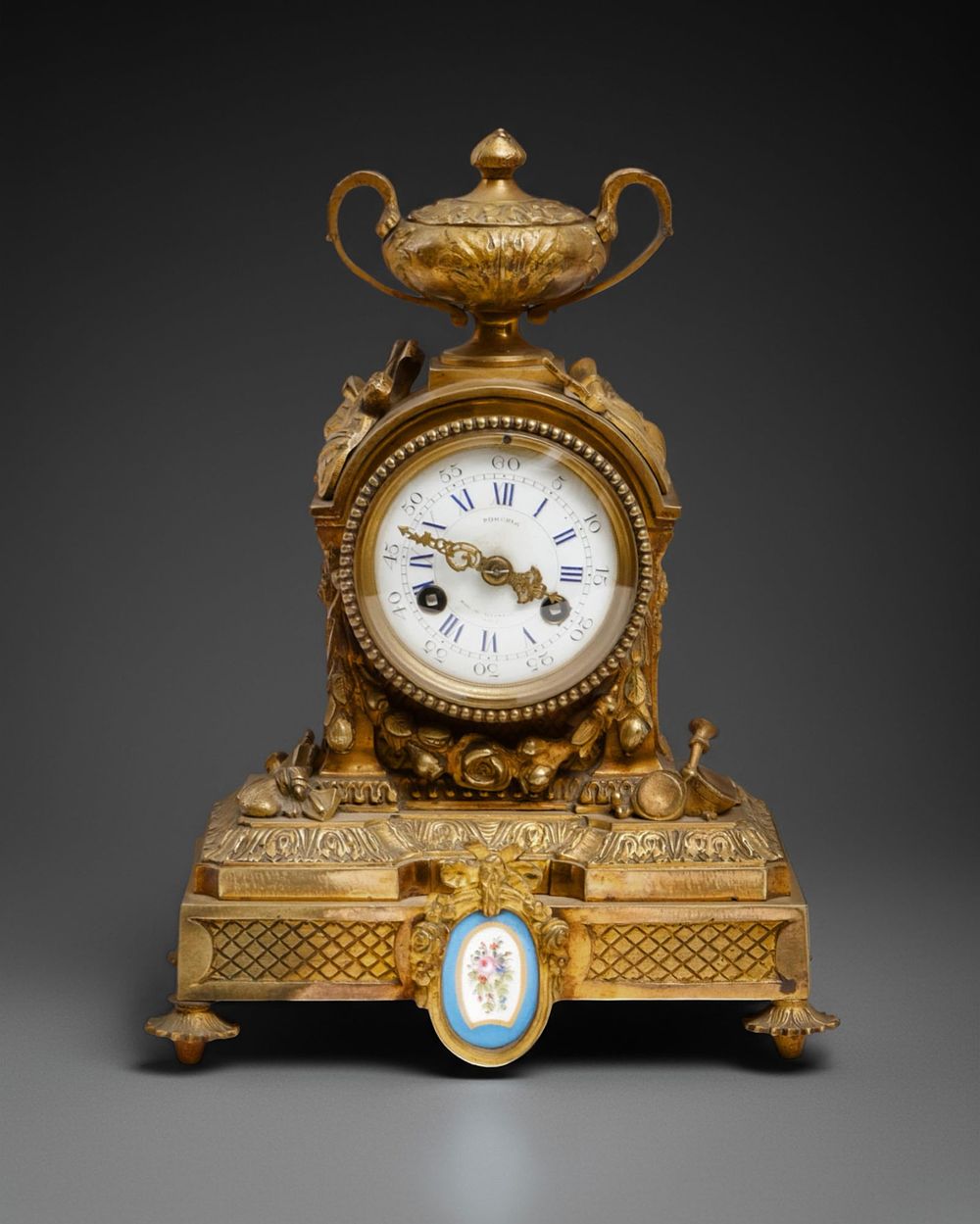 Lot 220: French Louis XVI-Style Gilt-Bronze Mantel Clock with Svres Porcelain Plaques, Movement by P. Marti