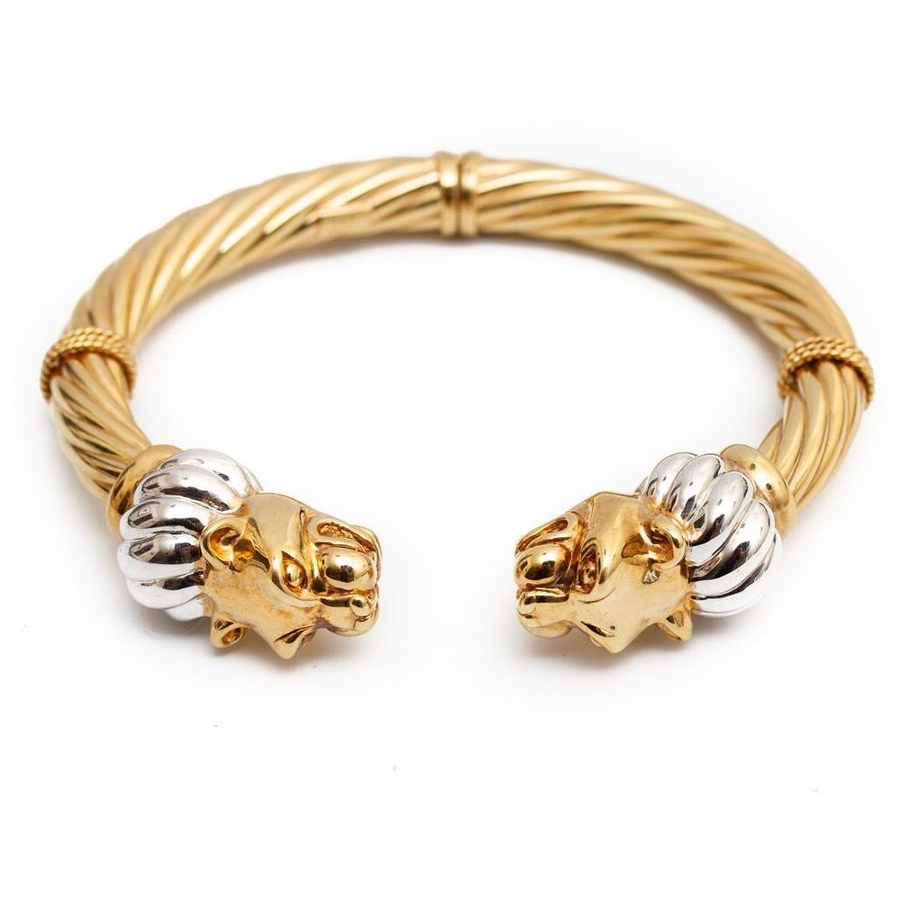 Lot 231: GIA 14k gold lion head bracelet
