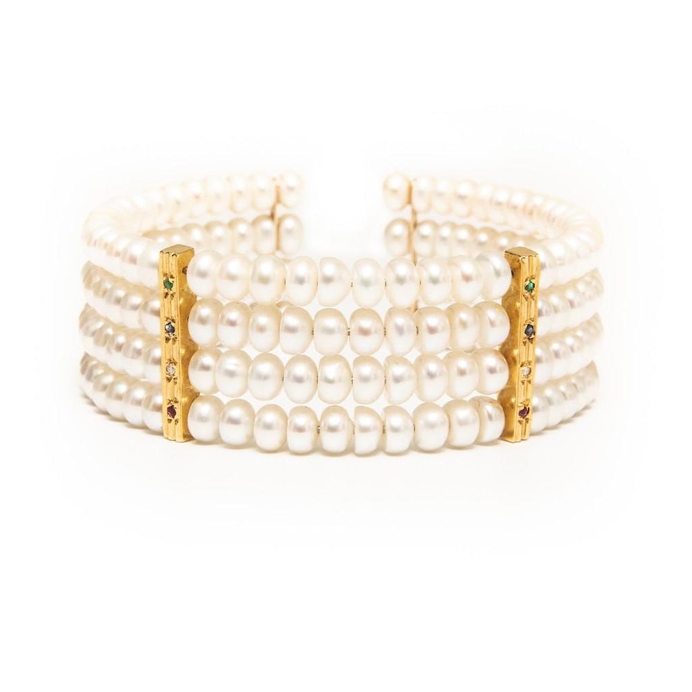 Lot 303: Gold,cultured pearls, Emerald, sapphire, diamond and