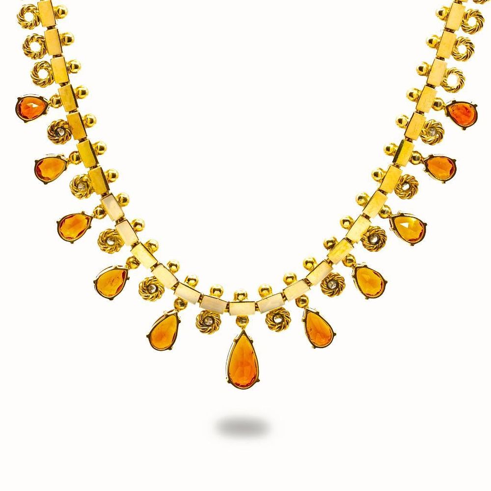 Lot 305: GIA vintage 18K Diamond and topaz necklace