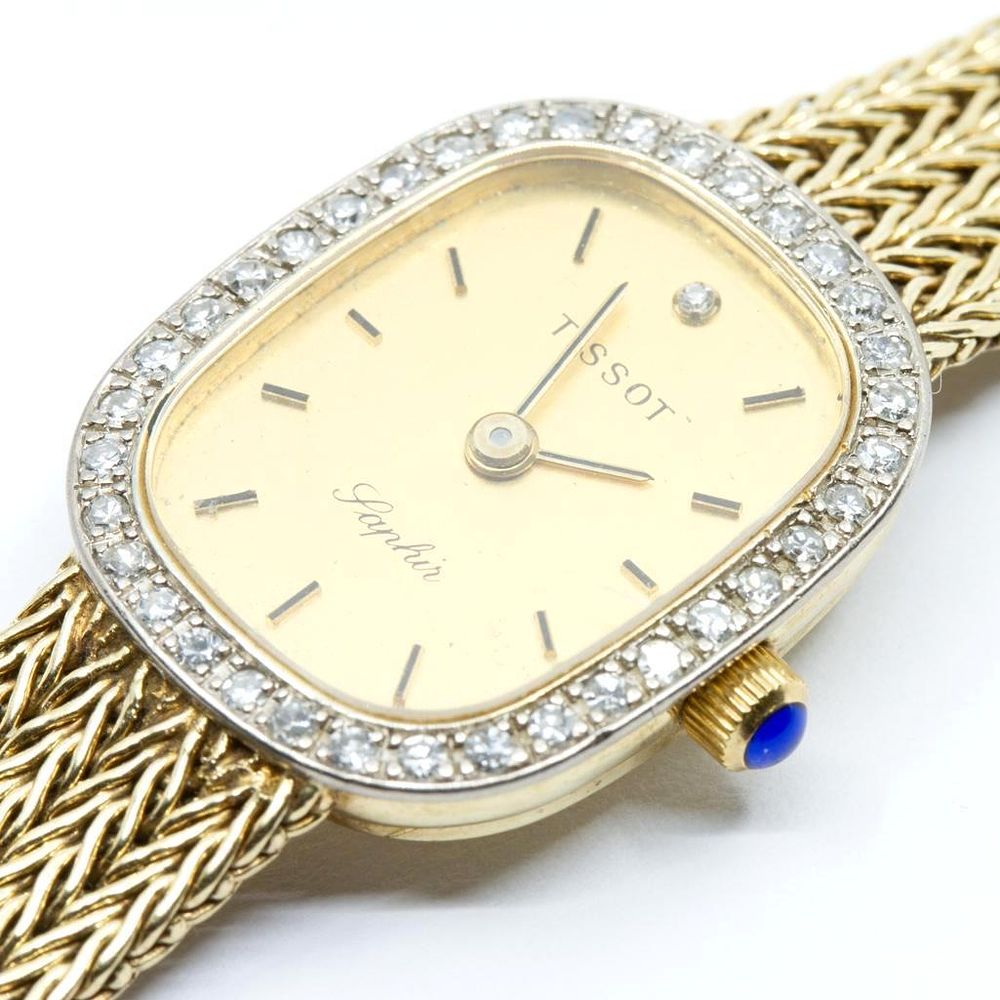 Lot 457: Tissot 14kt gold and diamond Ladies "Saphir" watch