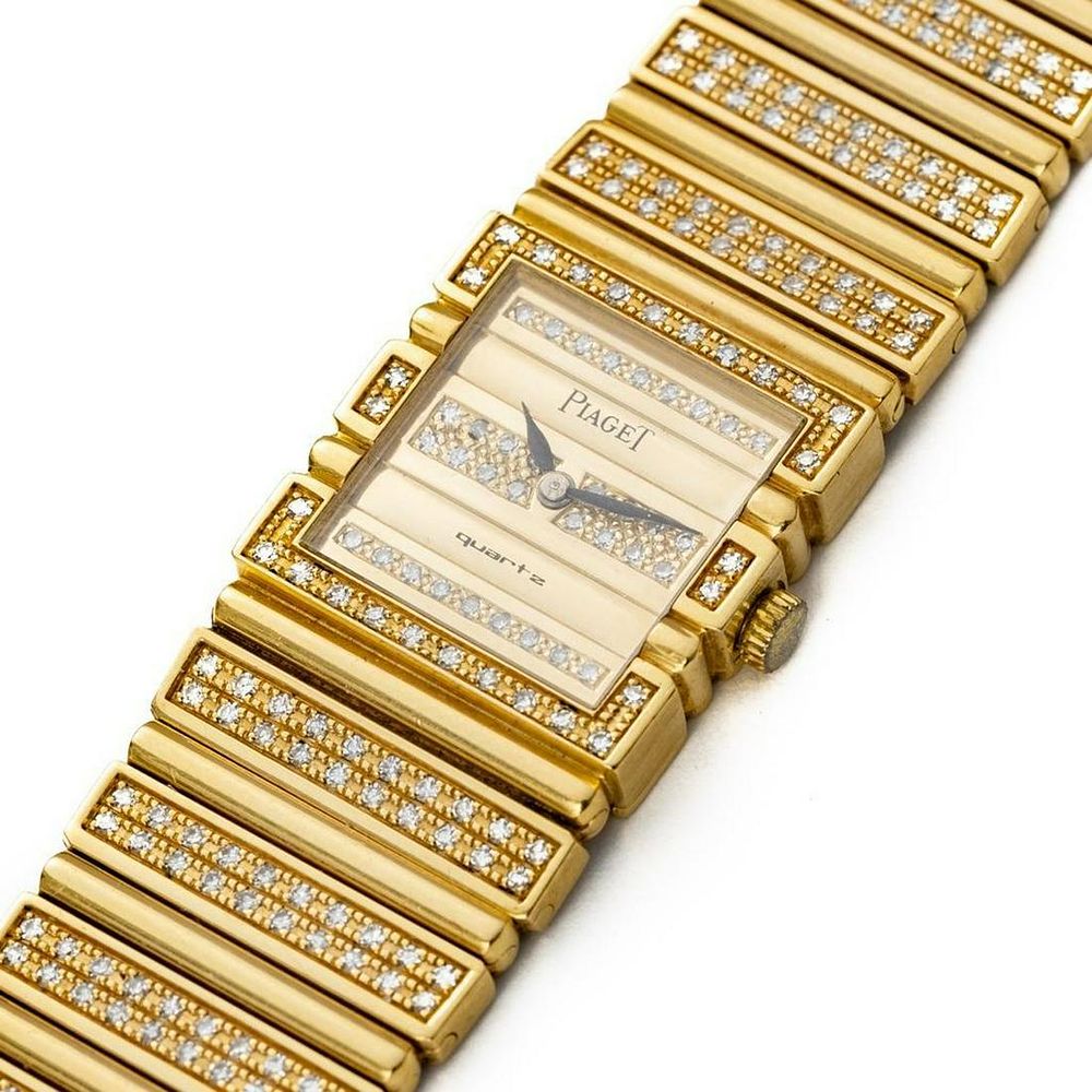 Lot 378: Piaget, Yellow Gold and Diamond Bracelet Watch