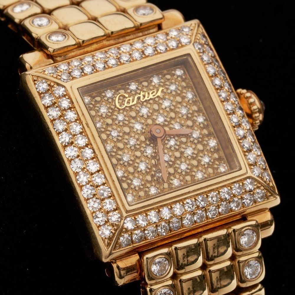 Lot 278: Cartier Signed Authentic 18kt Gold and Diamond Wristwatch with orig. diamond band