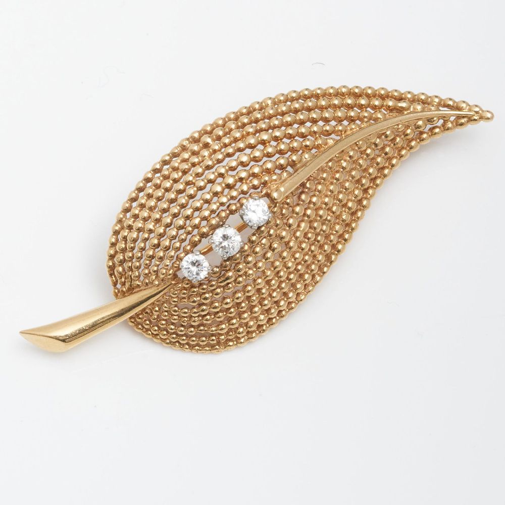 Lot 391: Tiffany and Co AUTHENTIC Signed Gold and Diamond Leaf Brooch