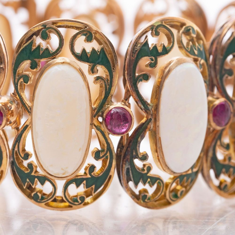 Lot 403: ANTIQUE 18K GOLD Opal, Ruby and Enamelwork Bracelet circa 1920's