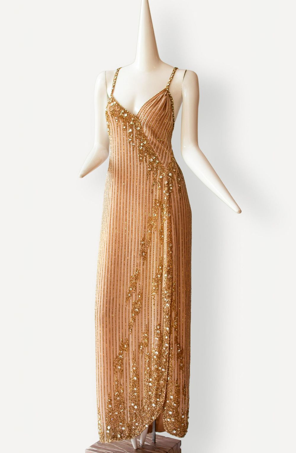 Lot 241: Bob Mackie Dramatic and amazing one of a kind beaded evening gown. Robert Gordon Mackie is an