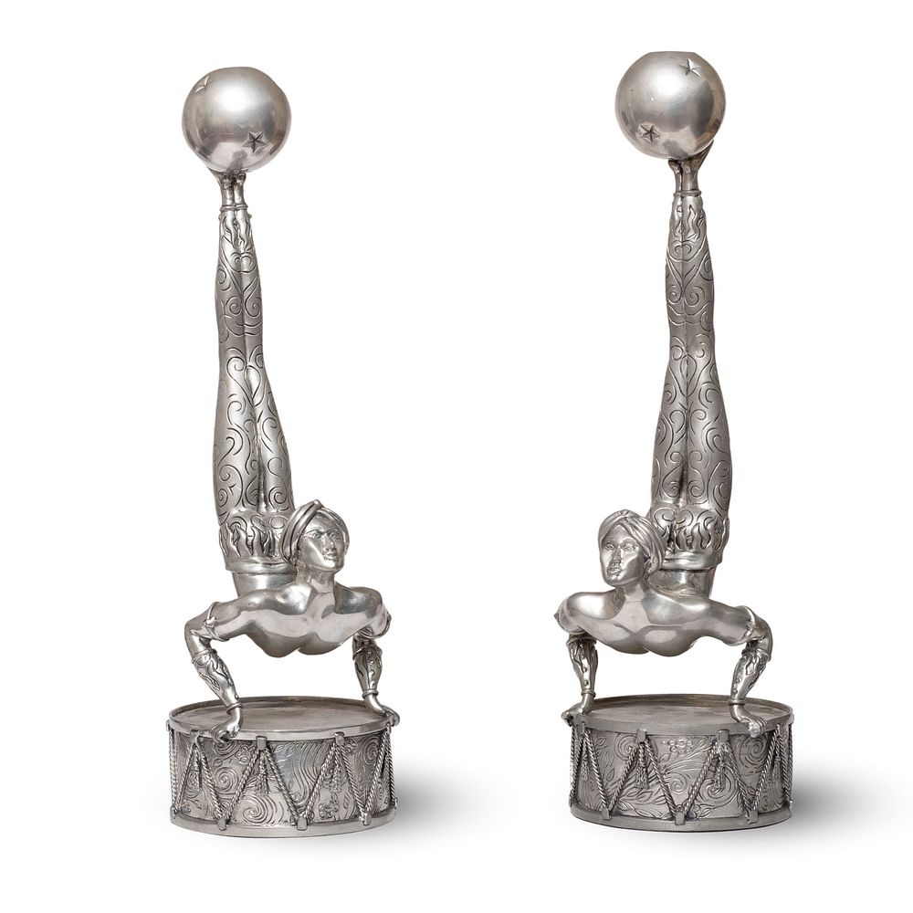 Lot 213: Pair of Italian Piero Figura for Atena Figural Polished Pewter Candlesticks