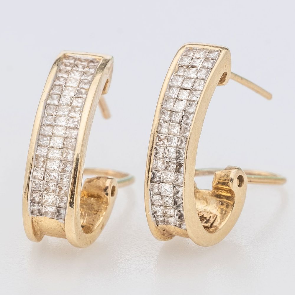 Lot 267: 14K Gold channel Set Pave Diamond Earrings