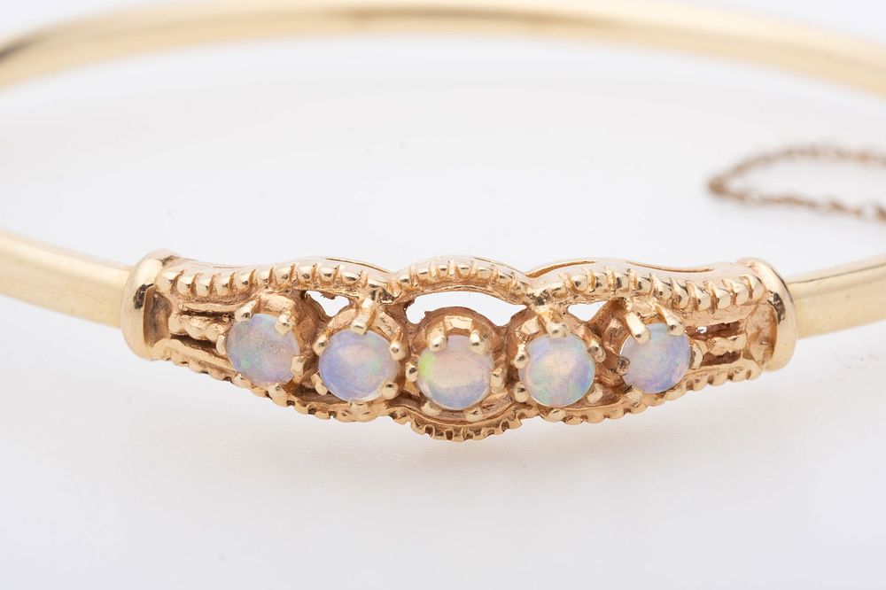 Lot 268: Antique 14k Gold Bracelet set with Opals