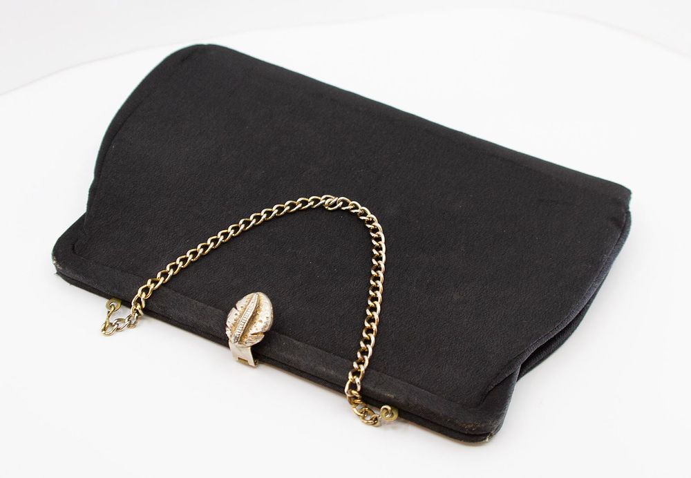 Lot 490: Vintage Little Black Clutch with Chain and Silk Lining