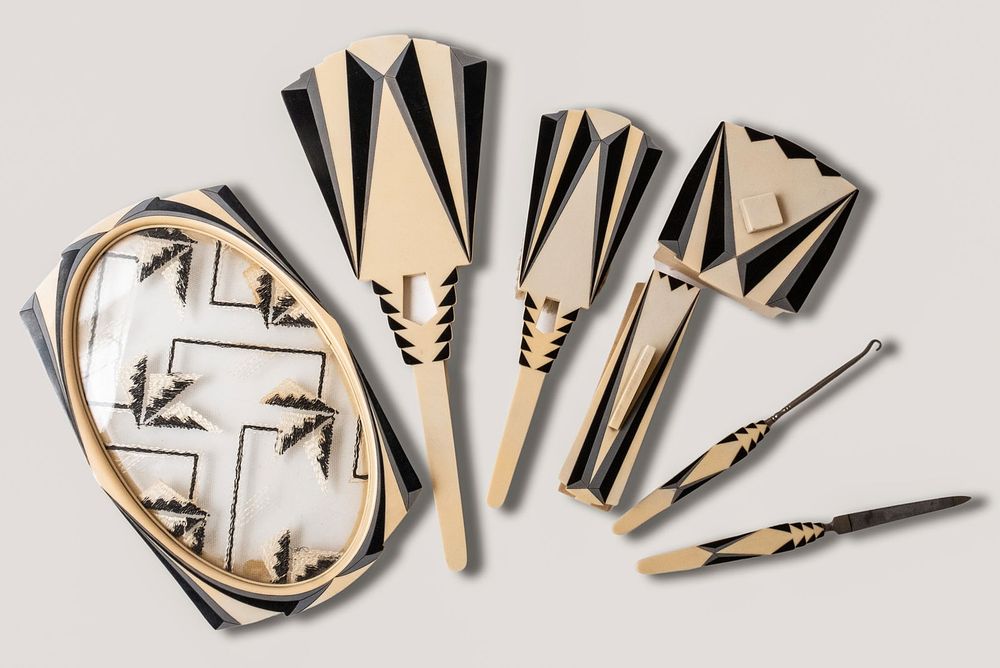 Lot 509: La Futuriste Art Deco Dresser Inlaid Celluloid Vanity Set by Agalin