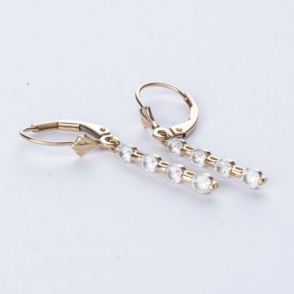 Lot 590: Vintage 14K Gold and Diamond Drop Earrings. Weighs 2 grams. Drop: 18.7mm