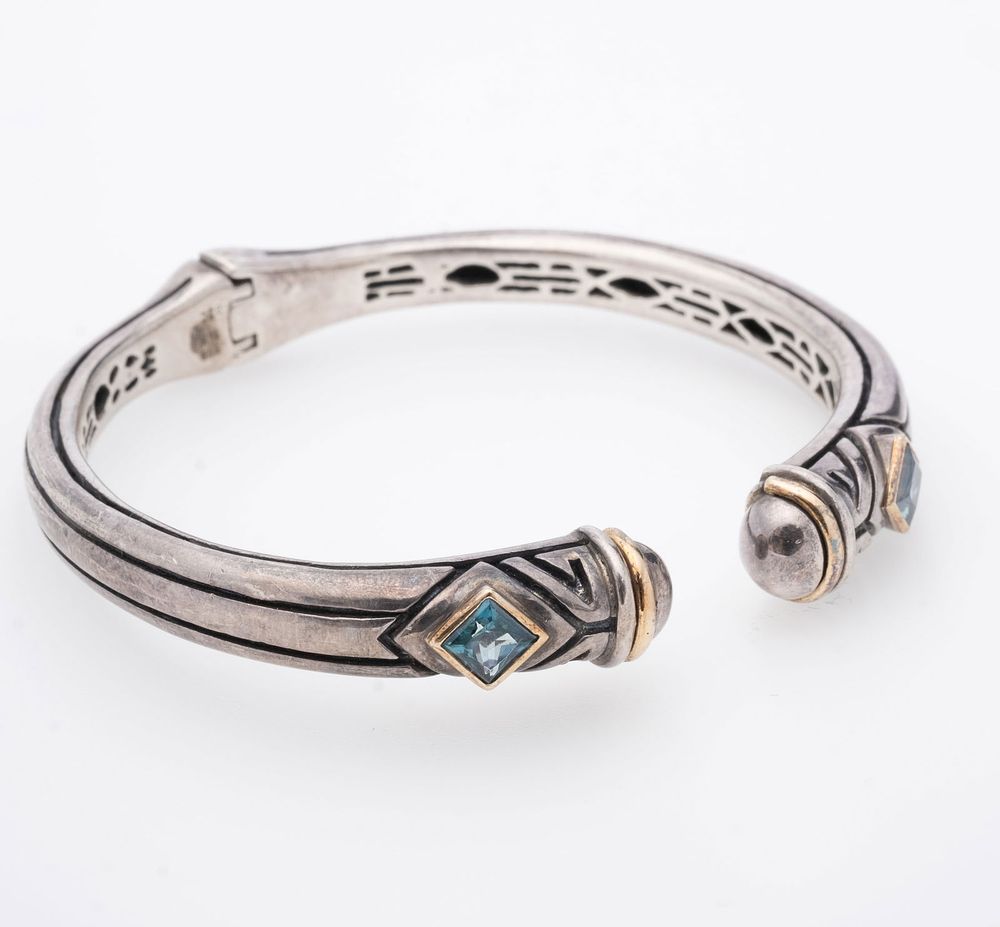 Lot 594: Signed Samuel Benham Sterling Silver hinged Topaz Bracelet with Gilt Accents