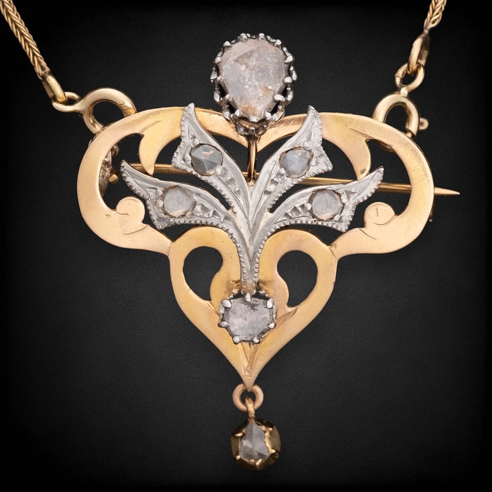 Lot 215: 19th Century French Art Nouveau 18K Gold and Diamond convertible Necklace/ Brooch Pendant