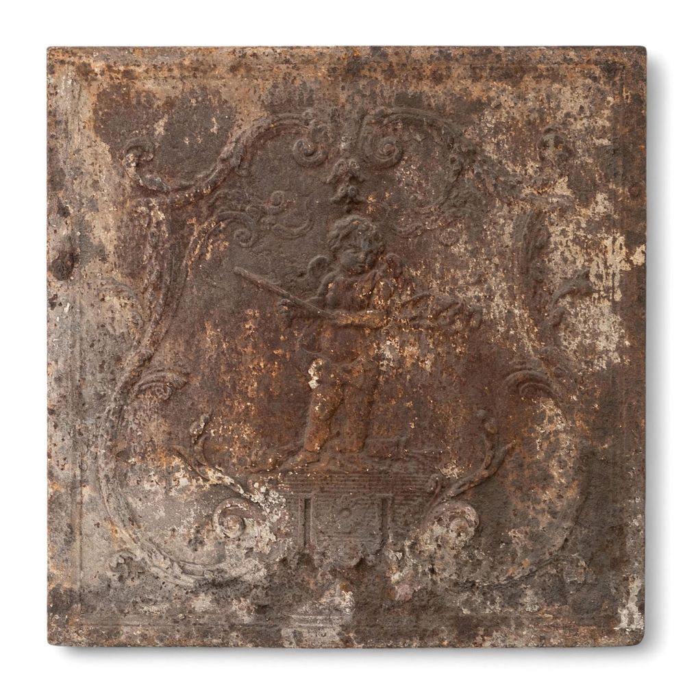 Lot 242: Cast-Iron Fireback Featuring a Cupid in Relief, Inside a Royal Crest, 17th century
