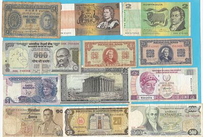 Lot of 12 circulated paper banknotes from various countries around the world, in good condition.