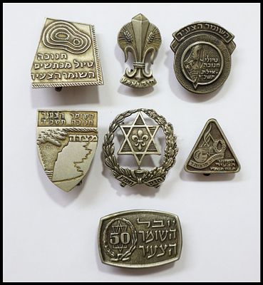 Group of 7 emblems and pins of the "HaShomer HaTzair" youth movement, 1960s. Units in lot: 7. 