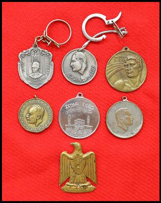Lot of 7 Arab and Middle Eastern medals, pendants and key fobs, 1960s. Units in lot: 7. 