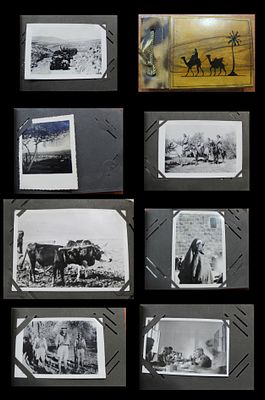 Photograph album with carved wooden covers (Holy Land handicraft), depicting a camel caravan 