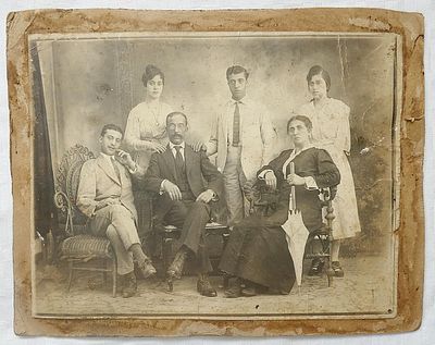 Antique cabinet photo of a family, Eastern Europe
Signed by photographer lower right 