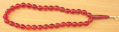 Islamic vintage cherry art glass misbaha 33 prayer beads, 48 gr.
Size of bead: 9 x 11 mm. Islami 