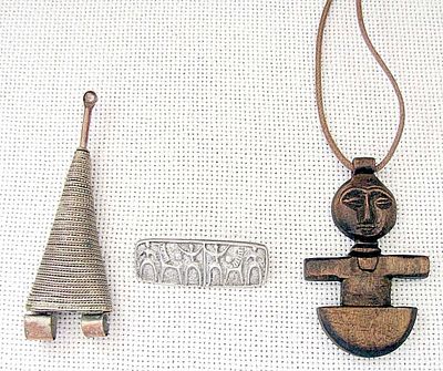 3 African antique and old jewelry items: 2 pendants and brooch.
1. Carved wood amulet pendant 
