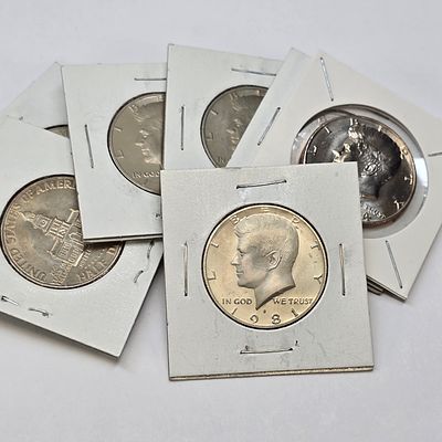 Kennedy Half Dollars. Lot of (8) Non-Silver Kennedy Half Dollars. All look to be in uncirculated 