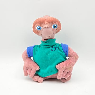 E.T. Doll 1996. 1996 E.T. Doll
The original glue holding the head to the shirt has let go and