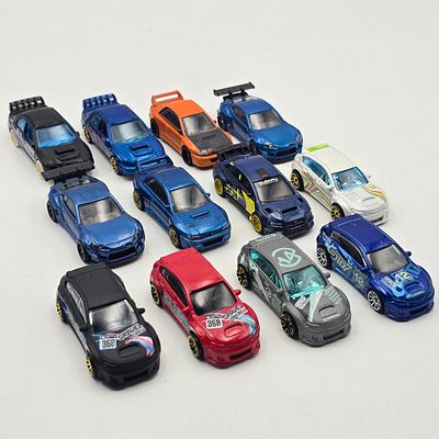 Hot Wheels Sports Car Lot. Hot Wheels Sports Car lot of 12 
Includes 12 Subaru sport cars 
All 