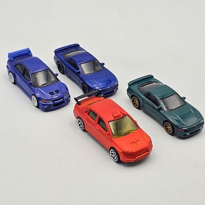 Hot Wheels Premium Mitsubishi Lot of 4. Hot Wheels Premium Mitsubishi lot of 4 
Includes a mix 