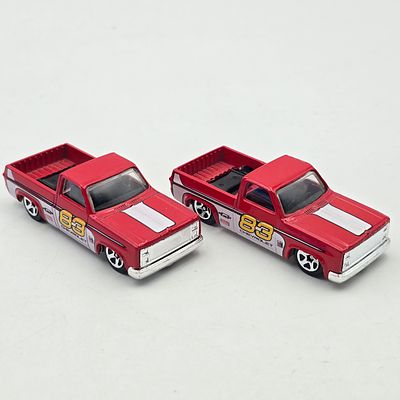 Pair of Hot Wheels Target 83 Silverado . Hot Wheels Target Exclusive 83 Silverado pair 
Both 