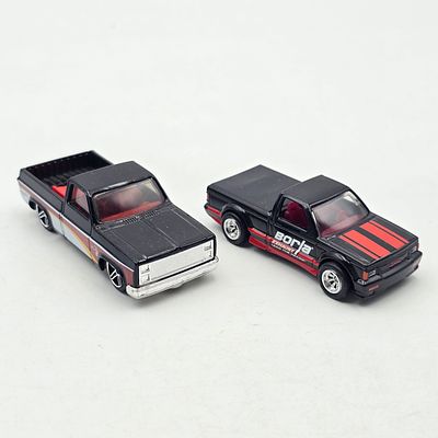 Pair of Hotwheel Chevy trucks 
Includes Walmart exclusive Silverado and Target exclusive 