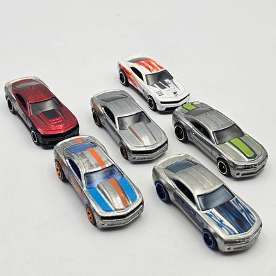Hot Wheels Zamac Camaro lot of 6 
Includes a mix Zamac Camaros as seen 
All appear to be good 