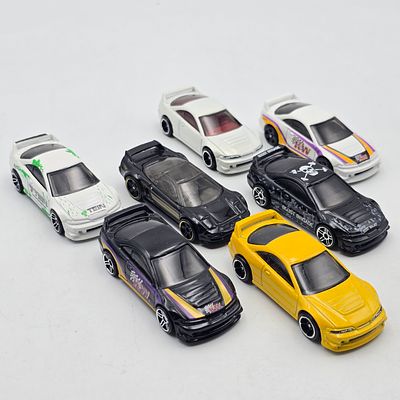 Hot Wheels Acura Integra lot of 7. Hot Wheels 01 Acura Integra GSR lot of 7 
Includes White and 