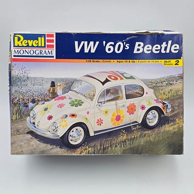 Revell VW Model Kit. Lot includes Revell 60' VW Beetle (1998) 
Model kit with the box and 