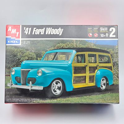 AMT Ford Model Kit. This lot includes AMT '41 Ford Woody Model kit (1999) 
With box and appears 