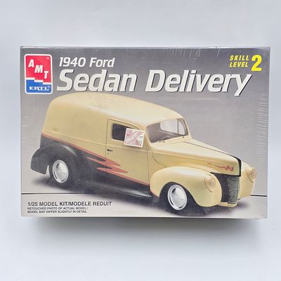AMT Ford Sedan Model Kit. This lot includes AMT 1940 Ford Sedan delivery model kit (1997) 
With 