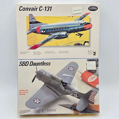 Pair of Testors Model Kits, Both have box and look to be complete and unassembled. 
1- SBD 