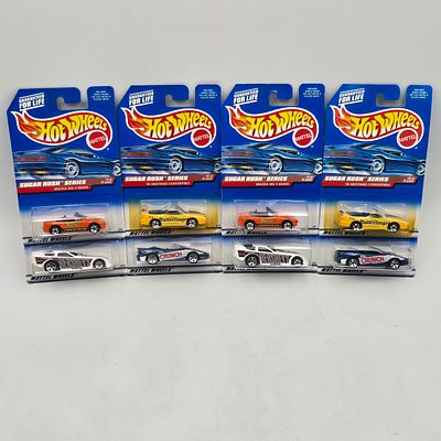 Hot Wheels Sugar Rush Lot of 8. Lot of 8 Hot Wheels diecast cars from the Sugar Rush Series (2 