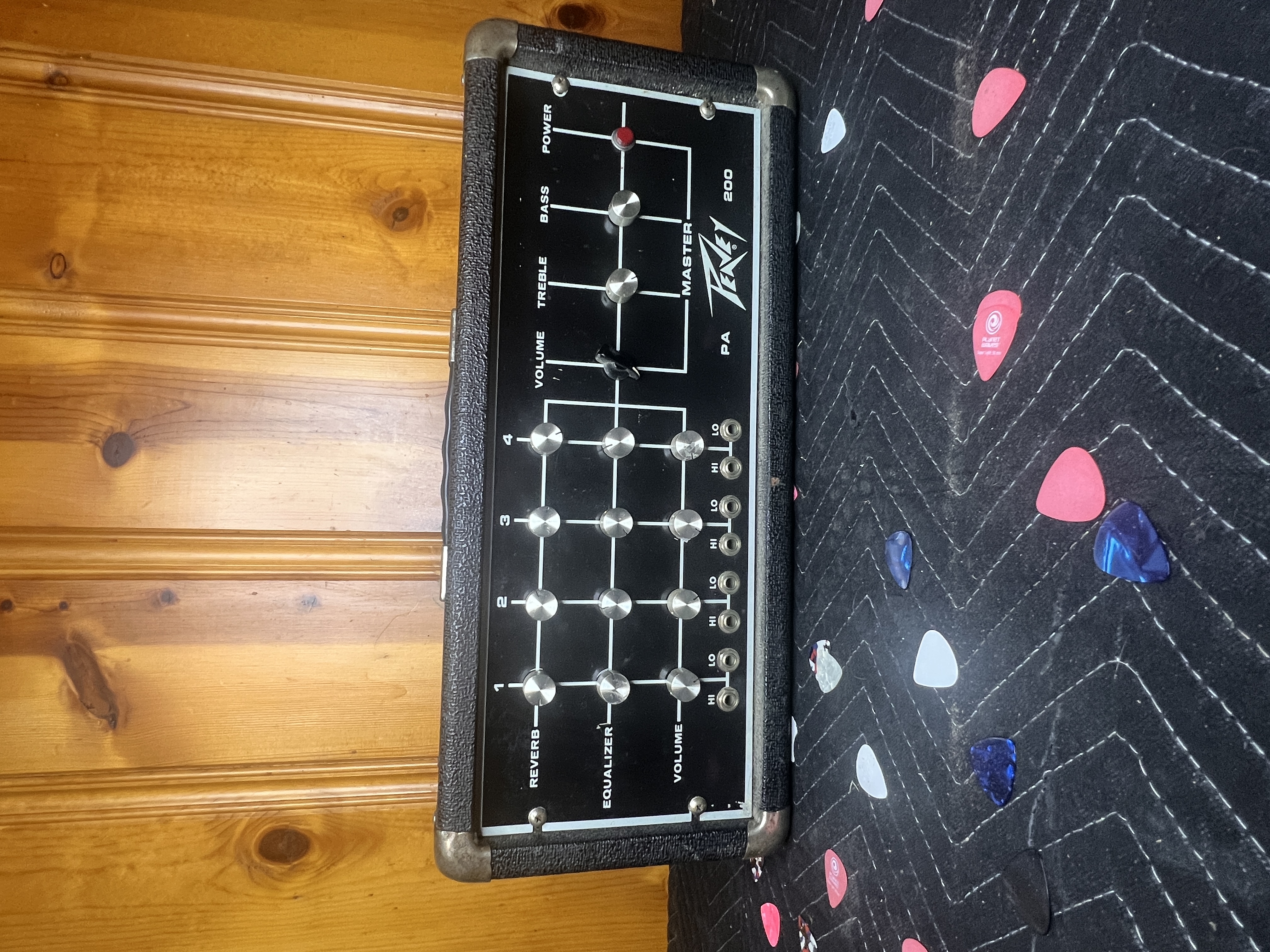 Two Peavey Amplifiers Including PA 200 Mixer Head and Rockmaster GT 5 Practice Amp