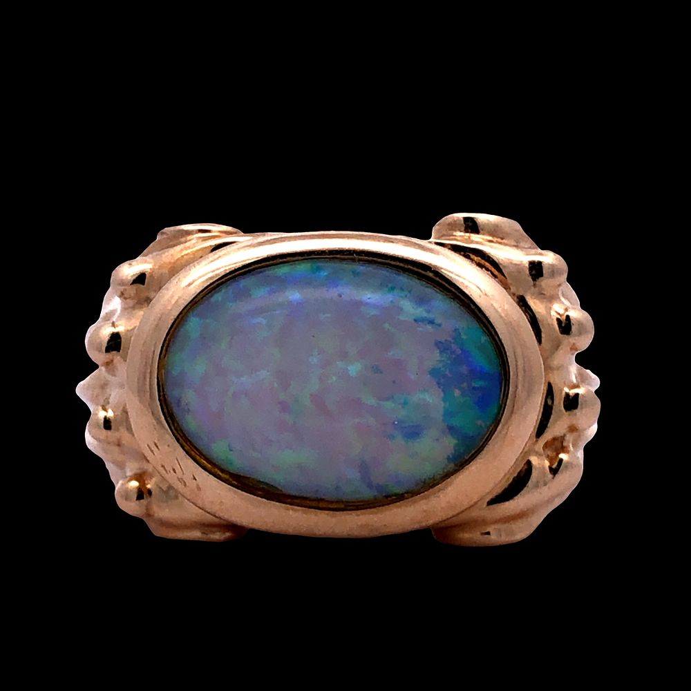 14K Jelly Opal Ring. S/8.2-AYS 
This striking ring features a beautiful oval-cut jelly/water 